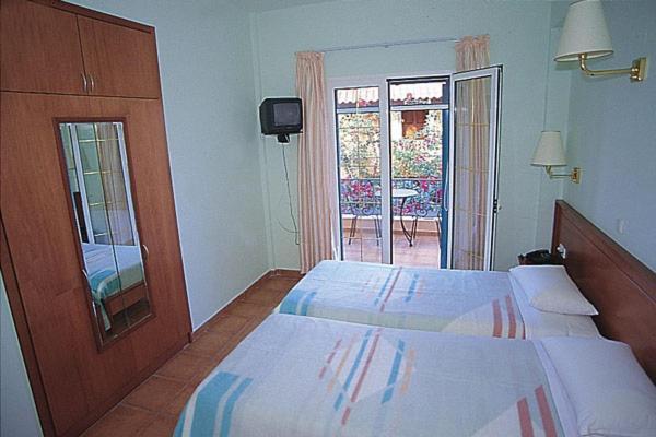 Poseidon Apartments อากิออส กอร์ดิออส ภายนอก รูปภาพ