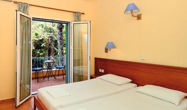 Poseidon Apartments อากิออส กอร์ดิออส ภายนอก รูปภาพ